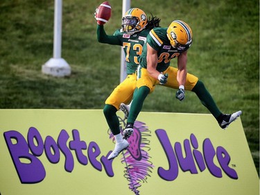 Edmonton Eskimos receiver Anthony Barrett celebrates after his touchdown against the Calgary Stampeders in CFL pre-season action at Calgary's McMahon Stadium on June 11, 2016.