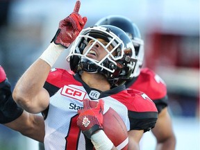 Calgary Stampeders Ciante Evans celebrates with teammates after running back an interception for touchdown against the Edmonton Eskimos in CFL football in Calgary, Alta. on Saturday June 11, 2016. Al Charest/Calgary Sun/Postmedia Network