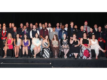 The honorees at the annual Chief's Awards Gala gather onstage at the start of the dinner Thursday evening June 2, 2016.