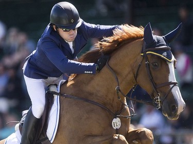 Conor Swail of Ireland rides Martha Louise to victory in the RBC Grand Prix at Spruce Meadows on day four of The National June 11, 2016.