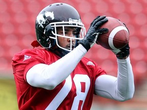 Calgary Stampeders receiver hopeful Jamal Nixon hauls in a throw during the team's rookie camp Friday May 27, 2016. The main camp opens Sunday. (Ted Rhodes/Postmedia)