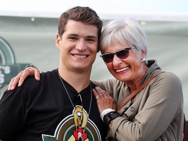 Calgary Flames forward Joe Colborne shares a moment with his grandmother Diana Colborne as George Canyon takes the stage at Colborne's Forces Benefit Thursday evening June 23, 2016 at the Military Museums.
