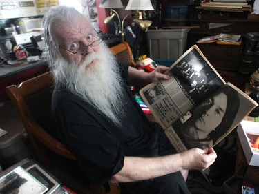 Kelly Jay holds a magazine on Star Wars that he created in the 70's with Graham Greene, pictured, at his home in Penbrooke Meadows.
