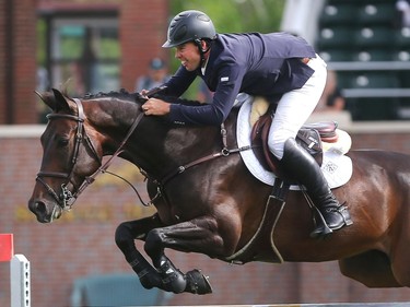 Jack Hardin Towell Jr. rides Lucifer V to victory  in the Back on Track Cup Wednesday June 8, 2016 on the opening day of The National at Spruce Meadows.