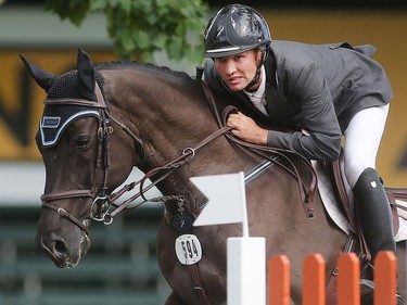 Canada's Brian Morton takes Atlantic T for a clean ride during the Back on Track Cup Wednesday June 8, 2016 on the opening day of The National at Spruce Meadows.