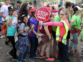 Olivia Sharpe from St. Philip school conducts a demonstration crossing during a fun-filled day appreciation day at Heritage Park on Thursday June 9, 2016 for AMA School Safety Patrollers.