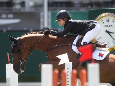 Kara Chad of Calgary rides Bella Strade in the ATCO Challenge on day two of the Spruce Meadows National Thursday June 9, 2016. (Ted Rhodes/Postmedia)