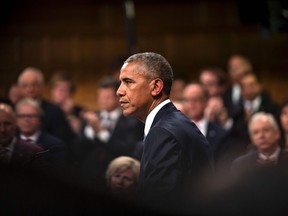 US President Barack Obama arrives to address Parliament in the House of Commons Chamber on Parliament Hill while attending the North American Leaders Summit on June 29, 2016 in Ottawa, Ontario. /
