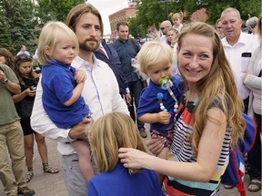 David and Collet Stephan are greeted by  supporters outside the courthouse in Lethbridge.
