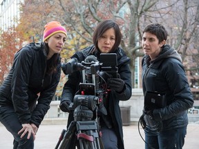 Laura Ricciardi, left, cinematographer Iris Ng and Moira Demos, right.