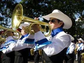 Members of the Calgary Round-Up Band perform during the 2013 Stampede Parade on Friday, July 5, 2013.
