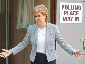 Scotland's First Minister and Leader of the Scottish National Party, Nicola Sturgeon, reacts as leaves after voting at a polling station at Broomhouse Community Hall in east Glasgow, on June 23, 2016.