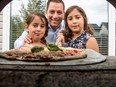 Gino Marghella making pasta and pizza with his daughters  Julia, 6, and Cristina, 9, at their home in Calgary, Ab., on Thursday June 9, 2016. Mike Drew/Postmedia
