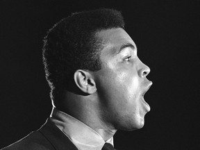 Muhammad Ali speaks at an anti-war rally at the University of Chicago in 1967.