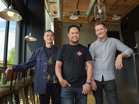 Wayne Leong, Ernie Tsu, and PJ L'Heureux pose for a portrait inside Trolley 5, , built on the site of the old Melrose Cafe on 17th Avenue SW,  in Calgary on Tuesday, June 21, 2016. Trolley 5, created by Leong, Tsu and L'Heureux, opens to the public on June 22, 2016.
