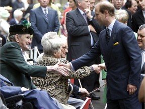 HRH Prince Edward, the Earl of Wessex, attended a garden party at Sunnybrook Hospital veterans' K-Wing visiting the more than 500 vets and commemorating their 60th anniversary. The vets honoured The Prince by naming a pavillion in their garden area after him. (Pictured) Ivor Foster, 86, of the Irish Regiment of Canada shakes hands with HRH Prince Edward during a walkabout meet and greet with the vets.