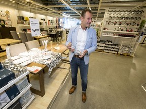 IKEA Canada president Stefan Sjostrand explains the design merits of a jug while speaking with Postmedia inside the IKEA store in Calgary, Alta., on Tuesday, June 14, 2016. The company is planning an expansion that will increase its square footage by about 10 per cent. Lyle Aspinall/Postmedia Network