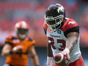 Calgary Stampeders running back Jerome Messam scores a touchdown against the B.C. Lions during pre-season CFL action in Vancouver on June 17, 2016.