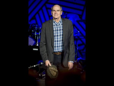 James Taylor hits the stage at the Scotiabank Saddledome in Calgary, Alta., on Wednesday, June 8, 2016. Lyle Aspinall/Postmedia Network