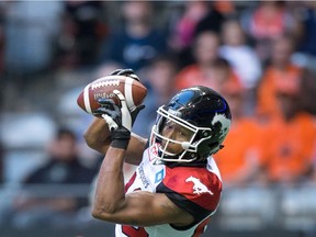 Calgary Stampeders' Kamar Jorden makes a reception for a touchdown during the first half of a CFL football game against the B.C. Lions in Vancouver, B.C., on Saturday June 25, 2016.