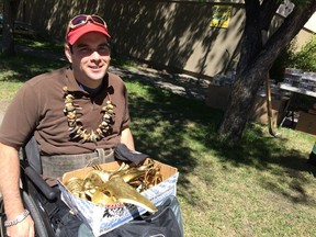 Morgan Thompson, at the Hillhurst/Sunnyside flea market in Calgary, Alta., on Sunday, June, 12, 2016. More than a year ago now, Thompson was shot by a police officer during an altercation in downtown Calgary, leaving him confined to a wheelchair with bullet fragments lodged in his spine. He's never been charged with a criminal offence in relation to the incident. Damien Wood/Postmedia Network