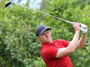 John Deering from Inglewood watches his shot after teeing off on the second hole during the Rileys Best Ball Finals at Canyon Meadows Golf and Country Club on Sunday. Deering and teammate Gerry MacDonald were main event champions.