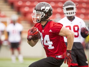 Greg Wilson runs with the ball during the Calgary Stampeders training camp at McMahon Stadium in Calgary, Alta., on Wednesday, June 1, 2016. The regular season begins on June 25, when the Stamps head to B.C. Lyle Aspinall/Postmedia Network