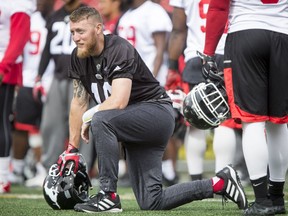 Quarterback Bo Levi Mitchell rests during the Calgary Stampeders training camp at McMahon Stadium in Calgary, Alta., on Thursday, June 2, 2016. The regular season begins on June 25, when the Stamps head to B.C. Lyle Aspinall/Postmedia Network