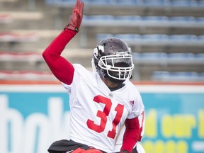 Brandon McDonald dances to country music during the Calgary Stampeders training camp at McMahon Stadium in Calgary, Alta., on Thursday, June 2, 2016. The regular season begins on June 25, when the Stamps head to B.C. Lyle Aspinall/Postmedia Network