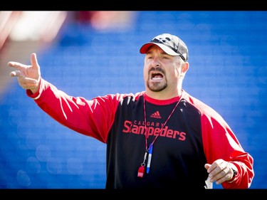 Offensive line coach Pat DelMonaco works during the Calgary Stampeders training camp at McMahon Stadium in Calgary, Alta., on Tuesday, May 31, 2016. The regular season begins on June 25, when the Stamps head to B.C. Lyle Aspinall/Postmedia Network