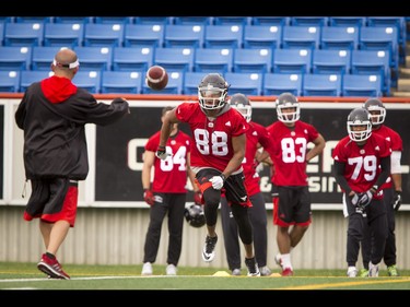 Kamar Jorden eyes a pass during the Calgary Stampeders training camp at McMahon Stadium in Calgary, Alta., on Wednesday, June 1, 2016. The regular season begins on June 25, when the Stamps head to B.C. Lyle Aspinall/Postmedia Network