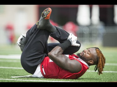 Carlton Mitchell stretches during the Calgary Stampeders training camp at McMahon Stadium in Calgary, Alta., on Thursday, June 2, 2016. The regular season begins on June 25, when the Stamps head to B.C. Lyle Aspinall/Postmedia Network