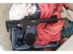 The Calgary Police Service seized more than $63,000 cash, 177.1 grams of cocaine worth about $17,200, a loaded 9 mm handgun, nine licence plates, and a Ruger 10/22 semi-automatic rifle (pictured) from a home in the 400 block of Marlborough Way N.E. on June 2, 2016.