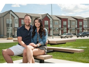 Zach Burnett and Trang Ly outside Chalet No6 by Hopewell Residential in Copperfield.
