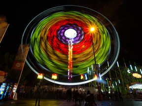 The bright lights of the midway rides at the Calgary Stampede.