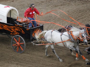 Roger Moore finishes first in Heat 3 of the Rangeland Derby chuckwagon races at the Calgary Stampede on Sunday July 10, 2016.