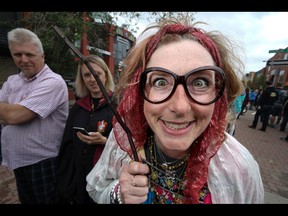 Tannis Claussen dressed up as Professor Trelawney in honour of the new Harry Potter book in Calgary, Ab., on Sunday July 31, 2016. Hundreds of Potter fans thronged Kensington which was reimagined as Diagon Alley to celebrate the release of Harry Potter And The Cursed Child.  Mike Drew/Postmedia