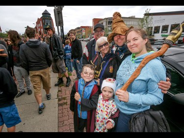 The Meier family, from grandkids to grandparents, got into the Harry Potter spirit in Calgary, Ab., on Sunday July 31, 2016. Hundreds of Potter fans thronged Kensington which was reimagined as Diagon Alley to celebrate the release of Harry Potter And The Cursed Child.  Mike Drew/Postmedia