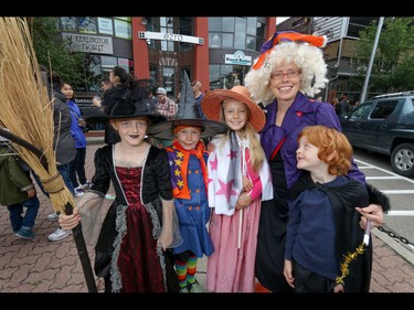 Anna Noordhof,  Elly Sweet, Ruby Sweet, Rebecca Gerritsen and Henry Noordhof all set for Harry Potter-ing in Calgary, Ab., on Sunday July 31, 2016. Hundreds of Potter fans thronged Kensington which was reimagined as Diagon Alley to celebrate the release of Harry Potter And The Cursed Child.  Mike Drew/Postmedia