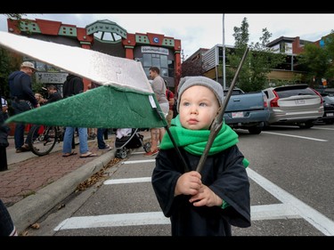 Littlest wizard Thomas Howe, 18 months, set to cast spells in Calgary, Ab., on Sunday July 31, 2016. Hundreds of Potter fans thronged Kensington which was reimagined as Diagon Alley to celebrate the release of Harry Potter And The Cursed Child.  Mike Drew/Postmedia