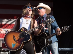 Big Kenny and John Rich of Big & Rich perform during the 4th Annual Windy City Smokeout, BBQ and Country Music Festival in Chicago on July 16, 2016 in Chicago, Illinois. The band will be headlining Country Thunder in Calgary on the weekend of Aug. 19-21.