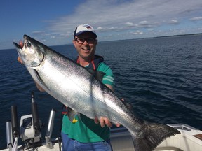 TDF host Jim Hoey with a giant Lake Ontario Salmon