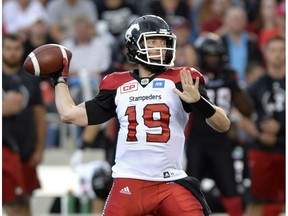 Calgary Stampeders quarterback Bo Levi Mitchell (19) looks downfield against the Ottawa Redblacks during the first half of a CFL football game in Ottawa on Friday, July 8, 2016. The Stamps return from their bye week to face the Winnipeg Blue Bombers on Thursday.