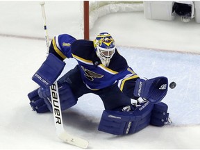 St. Louis Blues goalie Brian Elliott makes a save during the second period in Game 2 of the NHL hockey Stanley Cup Western Conference finals against the San Jose Sharks, in St. Louis.