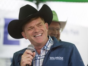 Brian Jean, leader of the Wildrose, the Official Opposition in Alberta, speaks during the Wildrose Stampede Stomp in Calgary, Alta., on Wednesday, July 6, 2016. Jean would later tell media he would be willing to work with Jason Kenney, a former MP who today announced a bid for the leadership of the Alberta Tories.