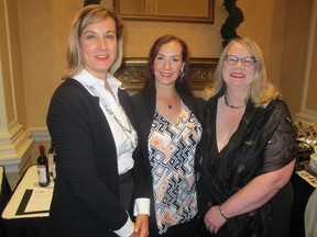 Cal 0730 Cork 3  All smiles, from left, at the Amadeus Cork & Canvas Gala in support of the Calgary Philharmonic Orchestra (CPO)  held recently at the Fairmont Palliser are Filter Boxx's Janet Yuchem, Brussa Bravo! Legacy Program founder Andrea Brussa and CPO board chair Heather Treacy, Q.C.