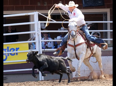 Caleb Smidt from Bellville, Texas posted the fastest time in the Tie-Down Roping event on Day 3 of the Calgary Stampede Rodeo, Sunday July 10, 2016.