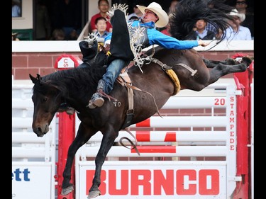 Jake Vold from Airdrie Alberta took the top spot in the Bareback event riding Whiskey Bent on Day 3 of the Calgary Stampede Rodeo, Sunday July 10, 2016.