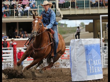 Kelley Schnauzer from Pueblo, Colorado competes in the Barrel Racing event  on Day 3 of the Calgary Stampede Rodeo, Sunday July 10, 2016.