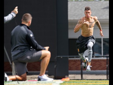 University of Calgary Dinos wide receiver Rashaun Simonise runs a 40 yard sprint for six NFL scouts at McMahon Stadium in Calgary on Monday July 11, 2016. Simonise has been declared eligible for the NFL supplementary draft.